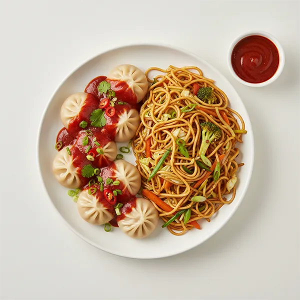 Schezwan Chicken Momo With Wok Tossed Vegetable Noodles